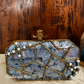 Long Octagon Mother of pearl clutch