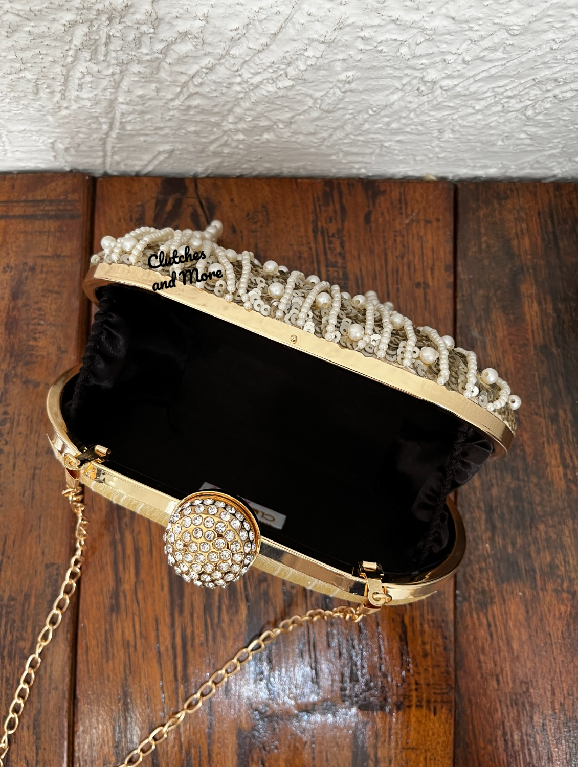 Capsule style silver clutch