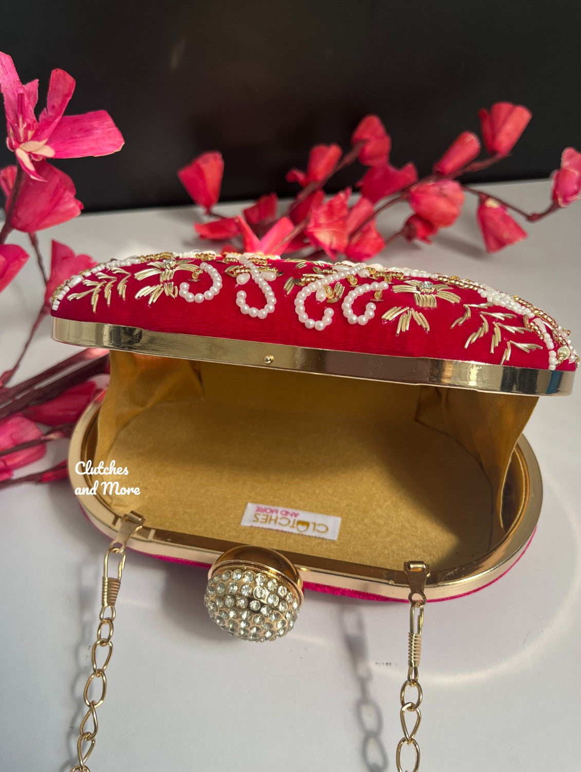 Rani Pink Capsule clutch