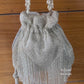 silver long tassle potli