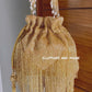 Gold tassle potli