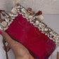 Deep red resin clutch