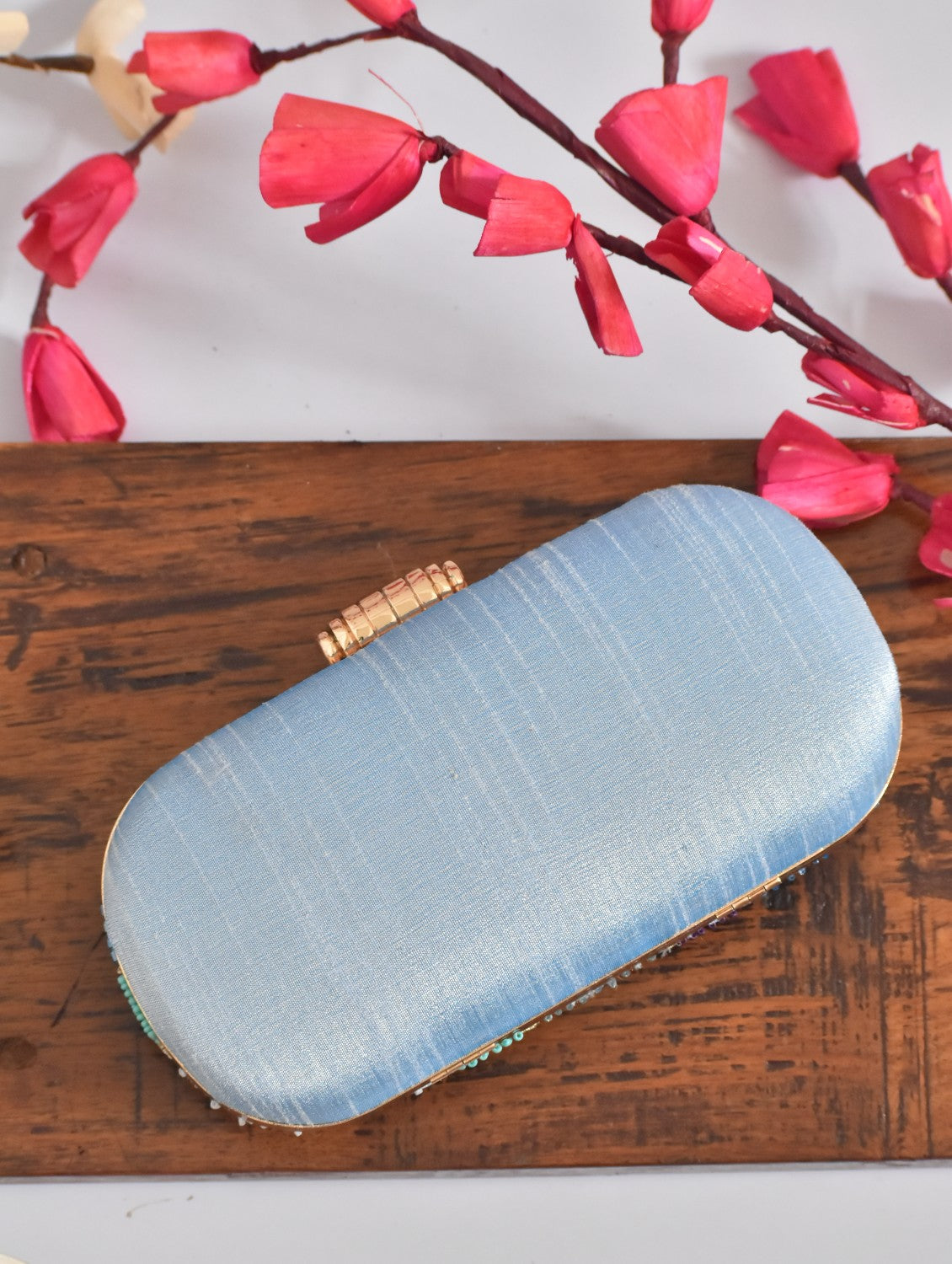 Blue capsule clutch