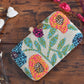 white floral beaded clutch