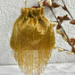 Gold tassle potli