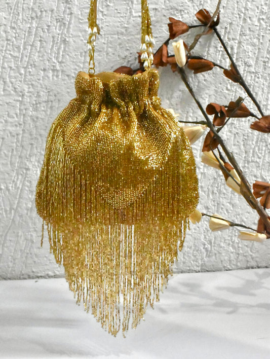 Gold tassle potli