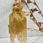 Gold tassle potli