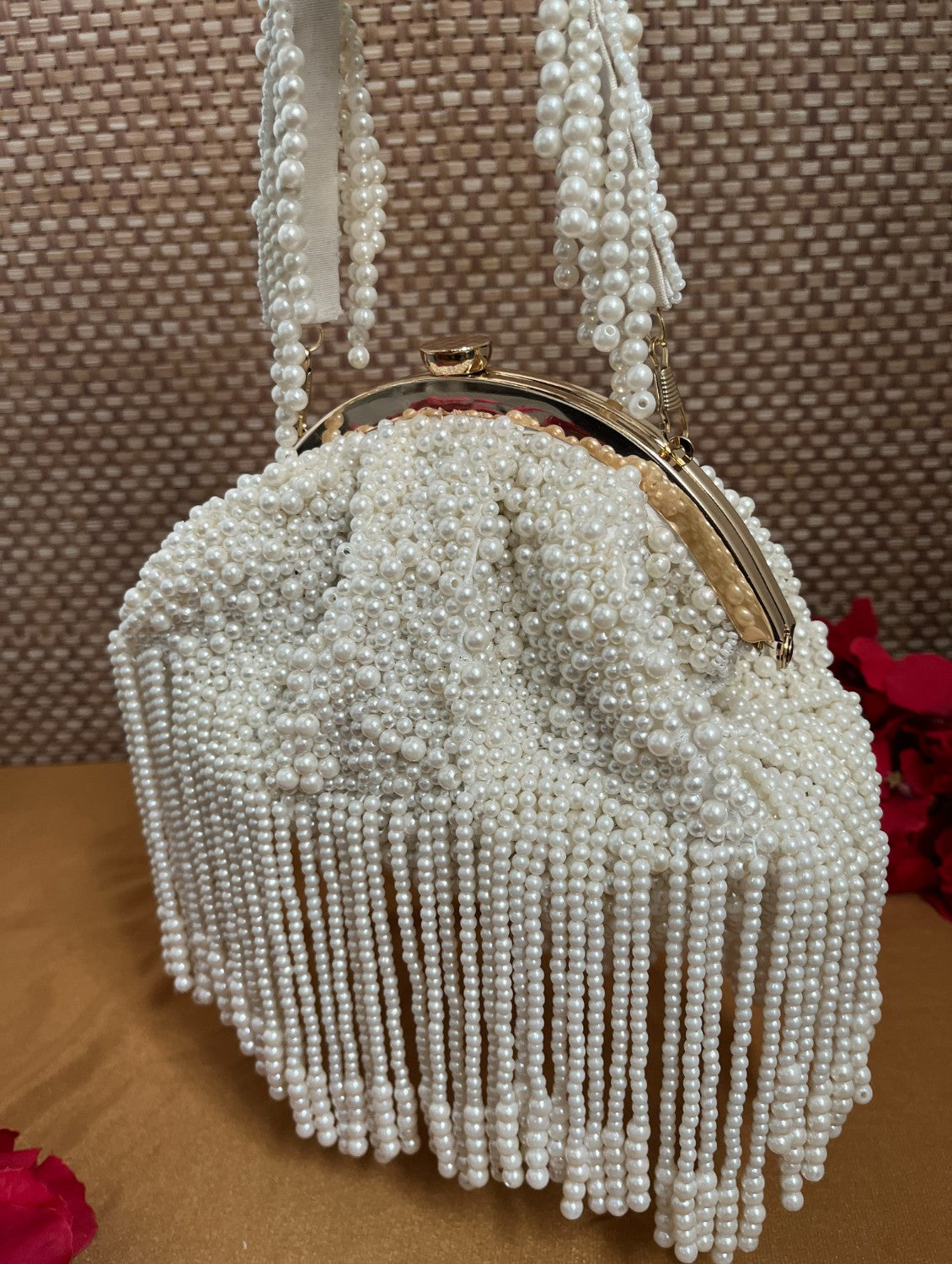 white pearl batua bag