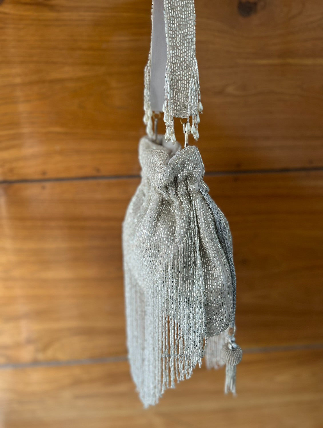 silver long tassle potli