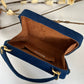 blue briefcase bag style clutch