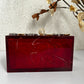 Deep red resin clutch