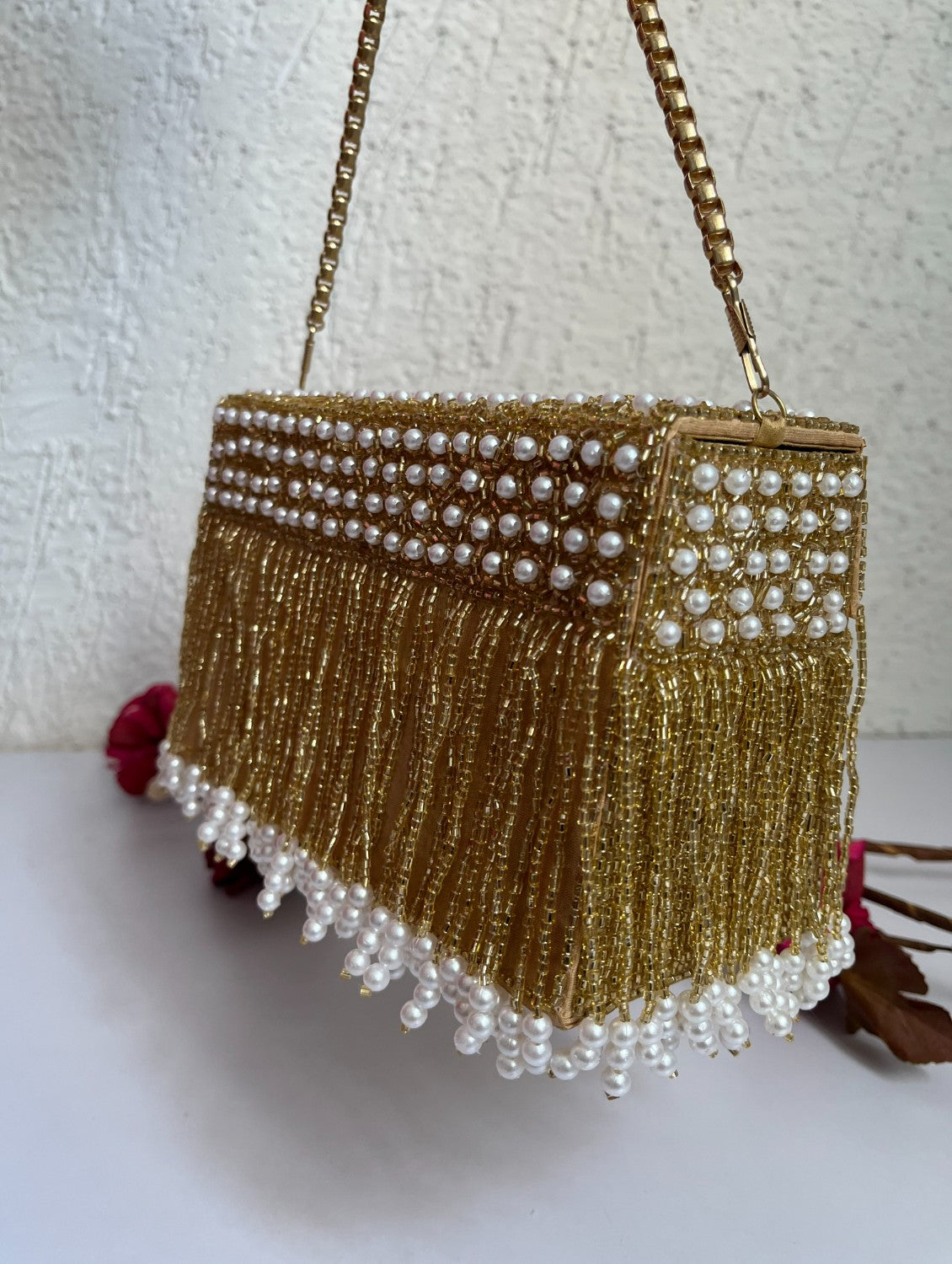 Gold and pearl box clutch