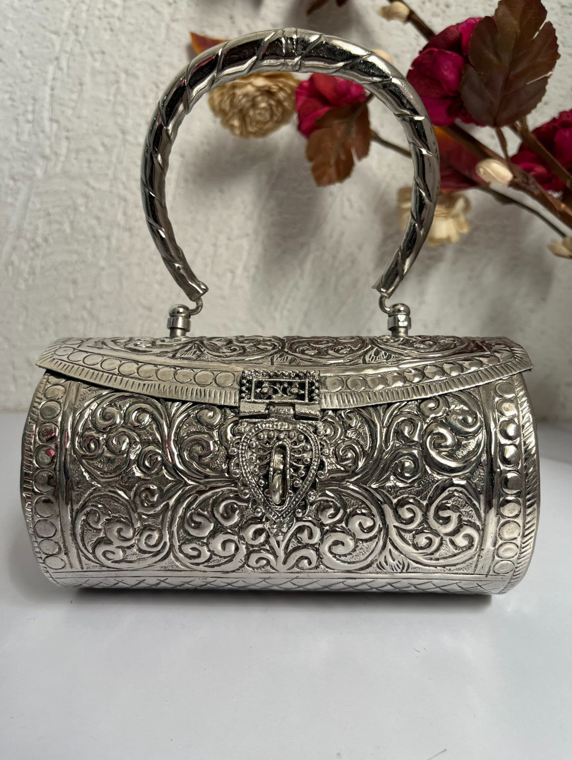 Cylindrical brass clutch silver