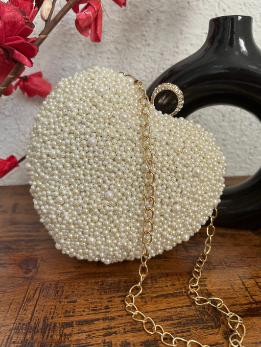 Heart pearl clutch